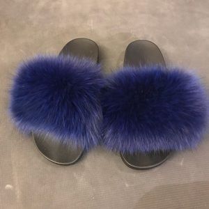 Blue fox fur slide